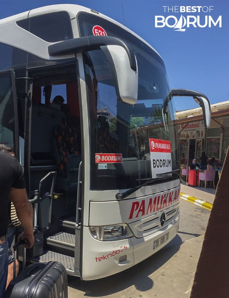 A bus in a bus station waiting for departure time to get to Bodrum.