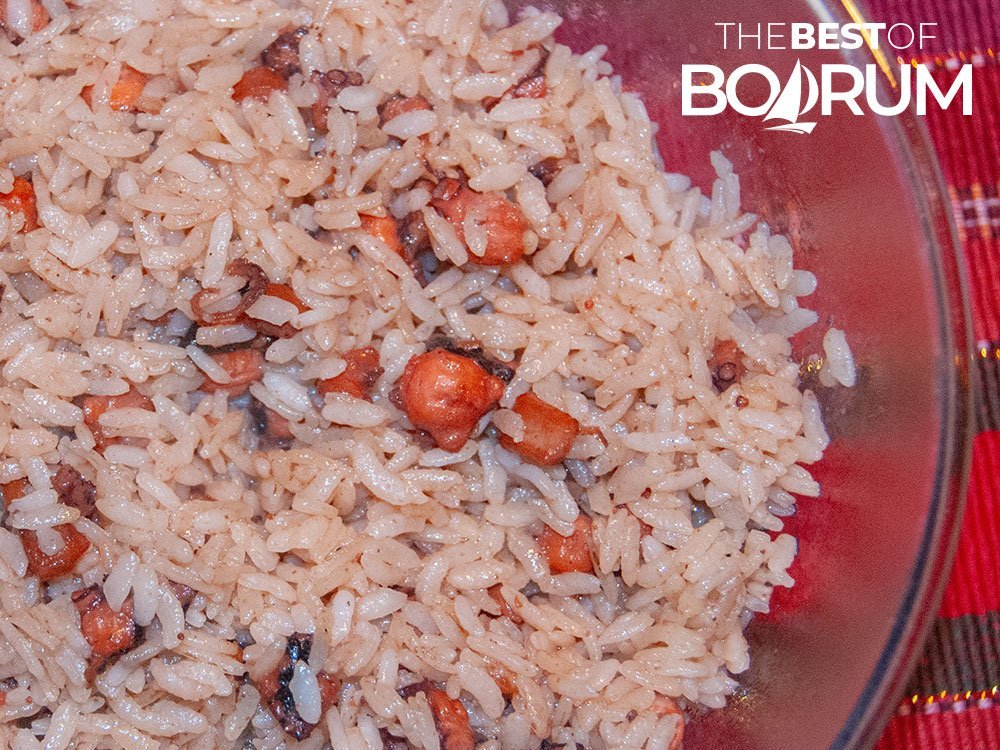 A bowl of octopus rice cooked in Cretan style.