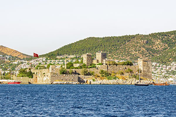 Bodrum Castle viewed from a boat on the sea.